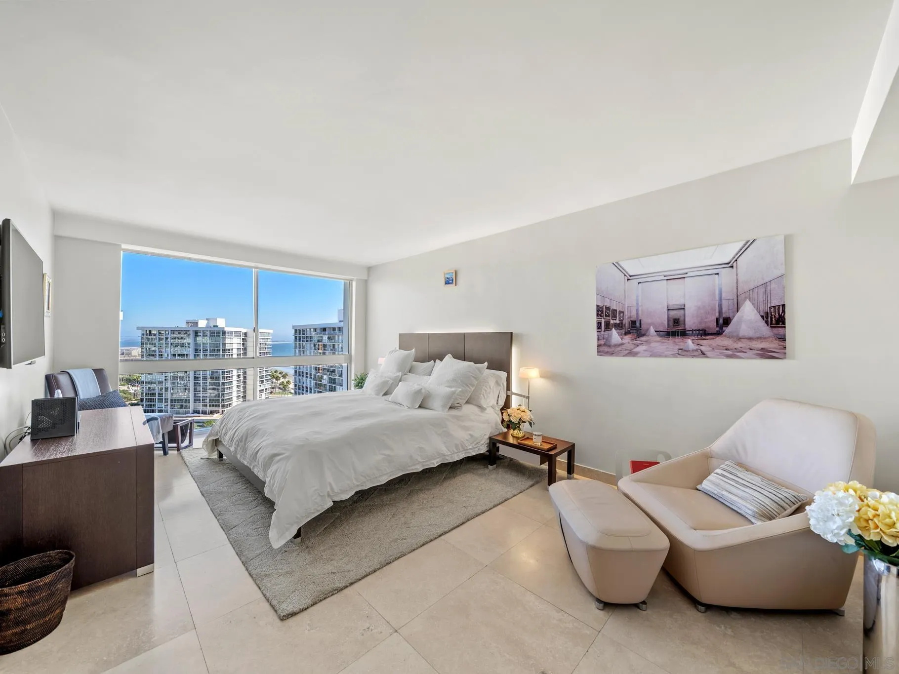 1730 Avenida Del Mundo, Unit 1503 Coronado, CA 92118 - Photo 22 of 47 a living room with furniture and a couch