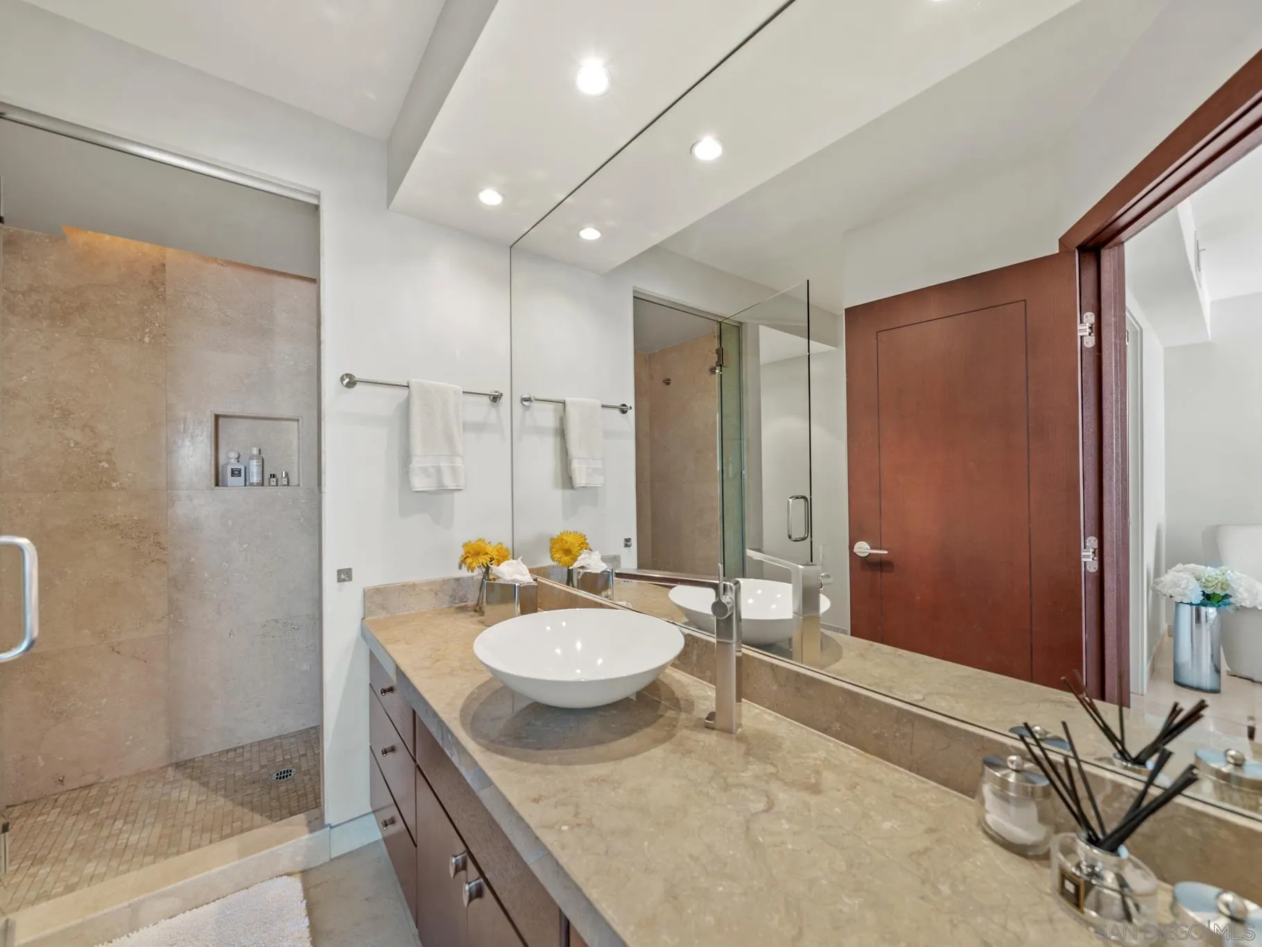 1730 Avenida Del Mundo, Unit 1503 Coronado, CA 92118 - Photo 27 of 47 a bathroom with a sink double vanity and a mirror