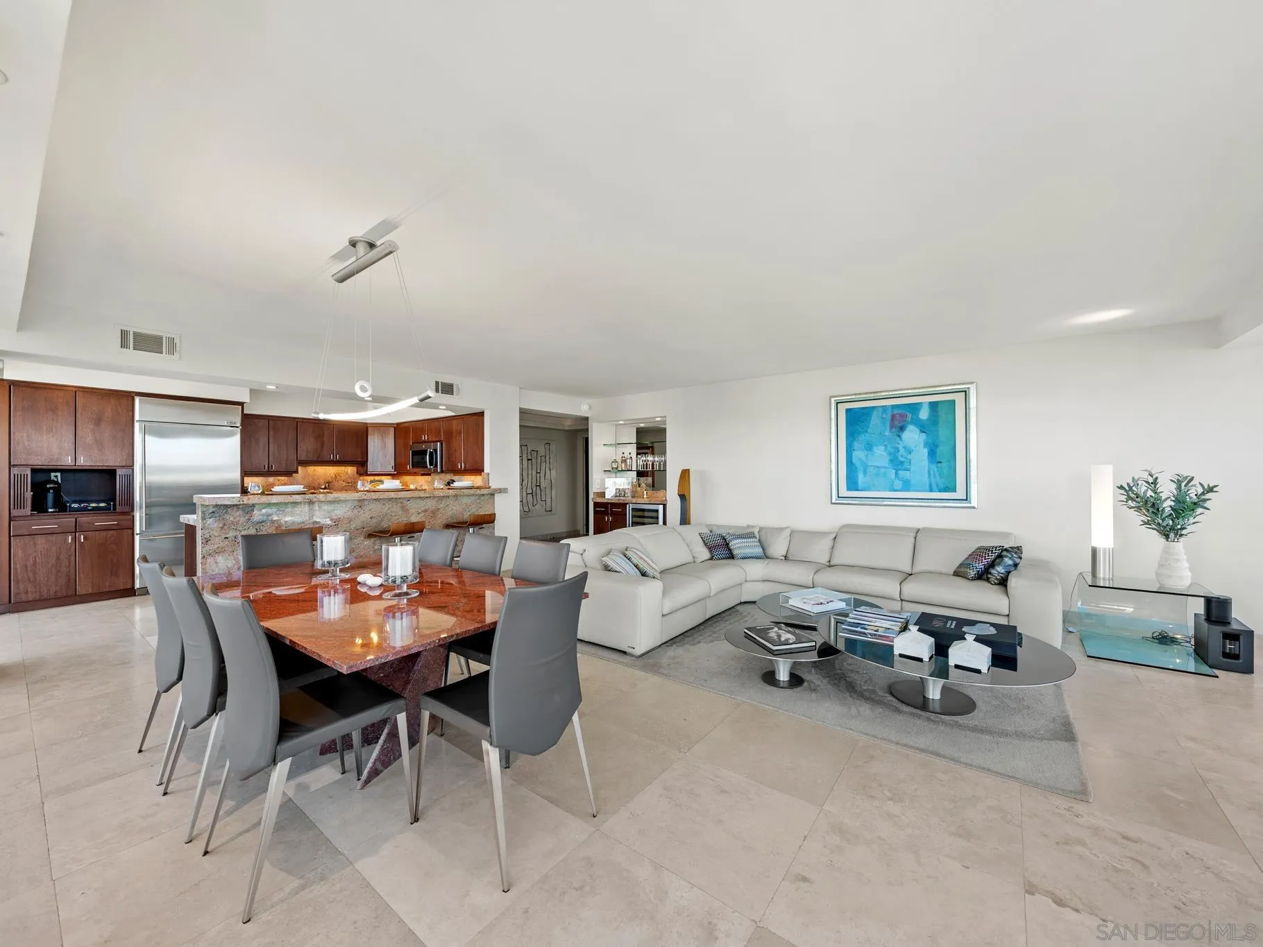 1730 Avenida Del Mundo, Unit 1503 Coronado, CA 92118 - Photo 8 of 47 a living room with furniture and a wooden floor