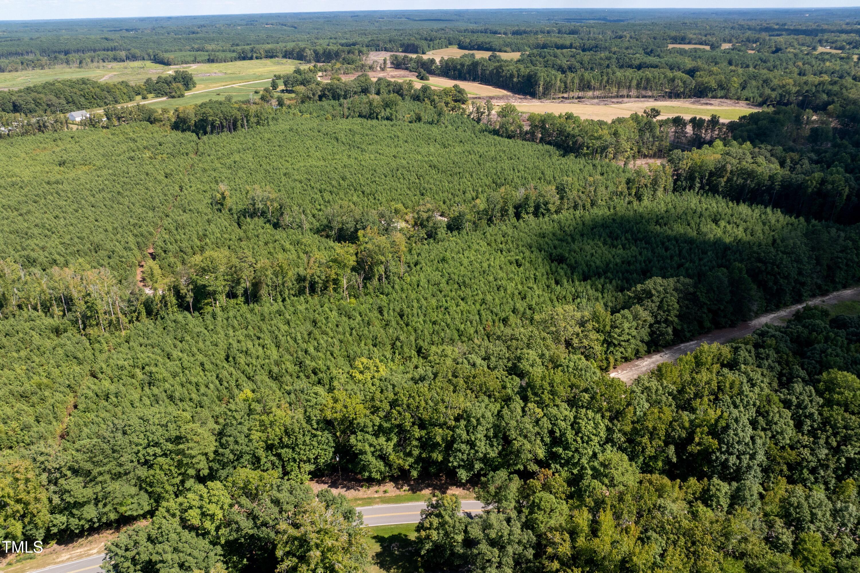 5 Julie McKnight Road Kittrell, NC 27544 - Photo 23 of 31 an aerial view of residential house with outdoor space and trees all around