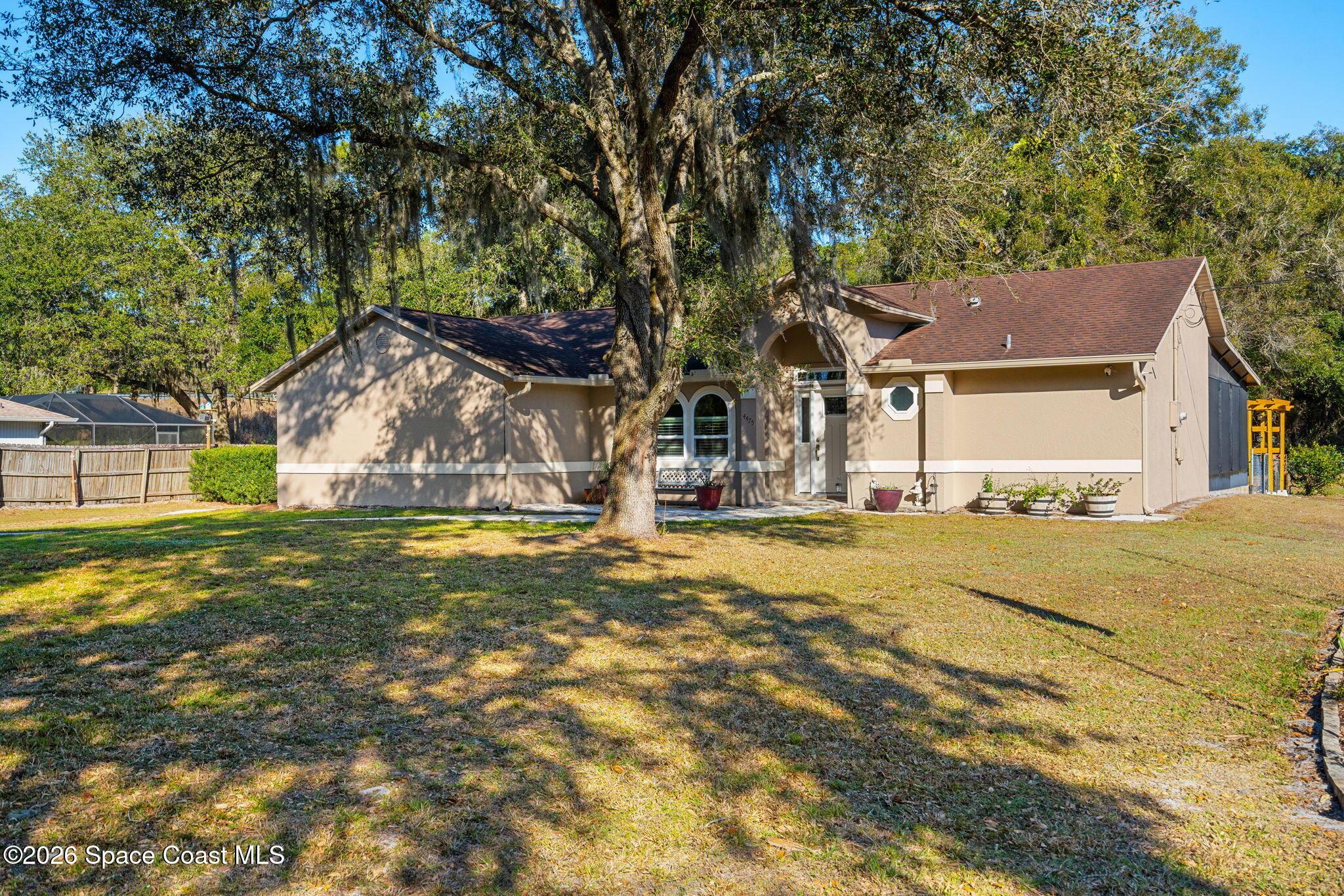 4475 Lemon Street Cocoa, FL 32926 - Photo 23 of 41 a view of a house with a yard