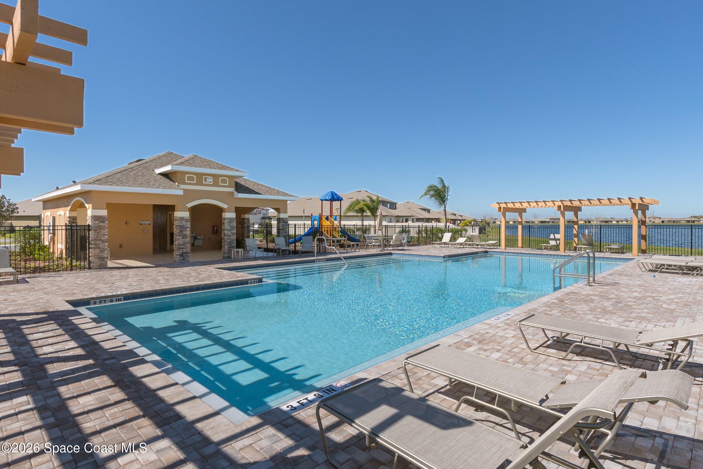 3419 Foggy Mist Road Southeast Palm Bay, FL 32909 - Photo 33 of 39 Community Pool