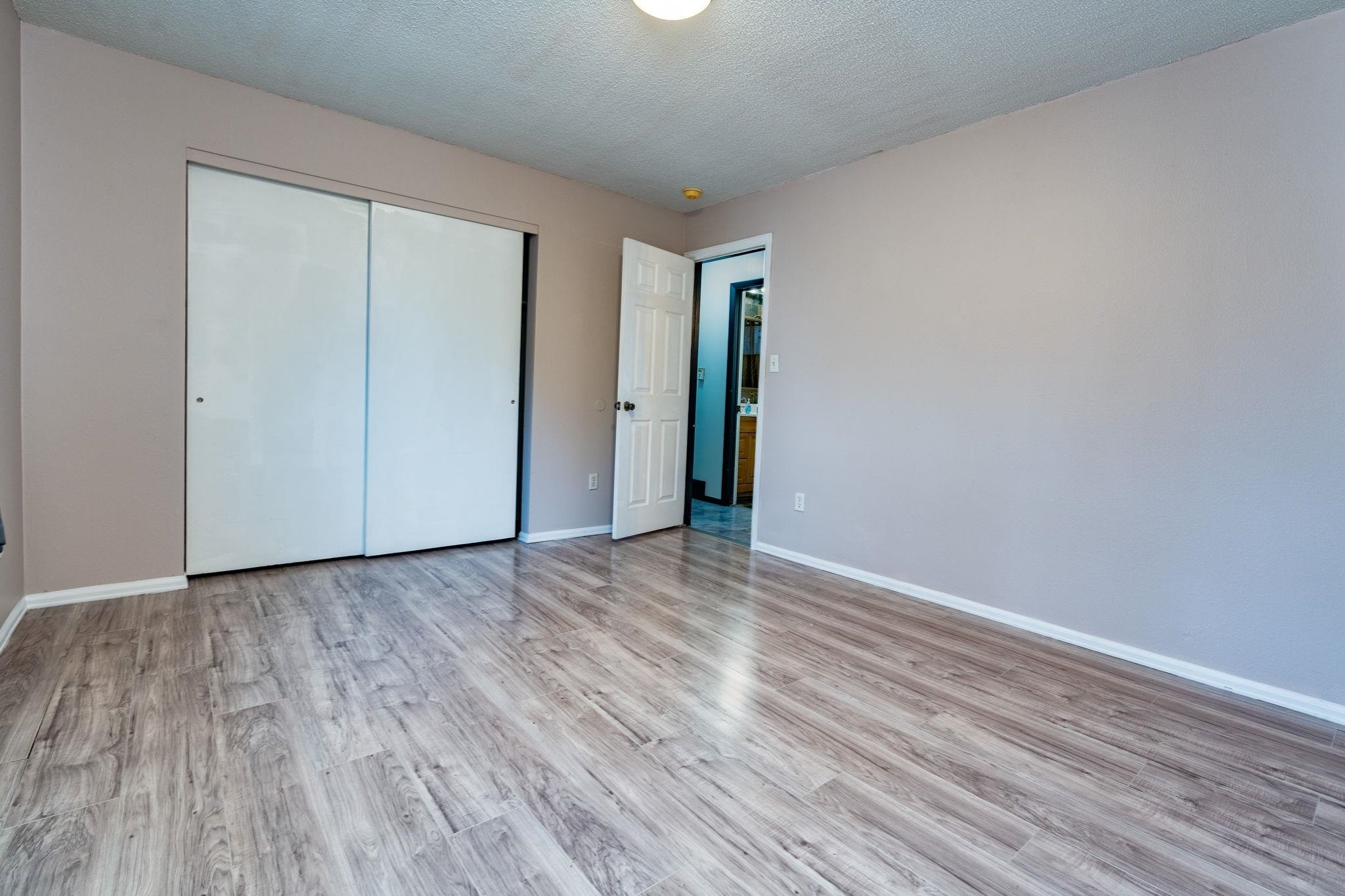 559 Court Road Grand Junction, CO 81501 - Photo 13 of 28 a view of an empty room with wooden floor