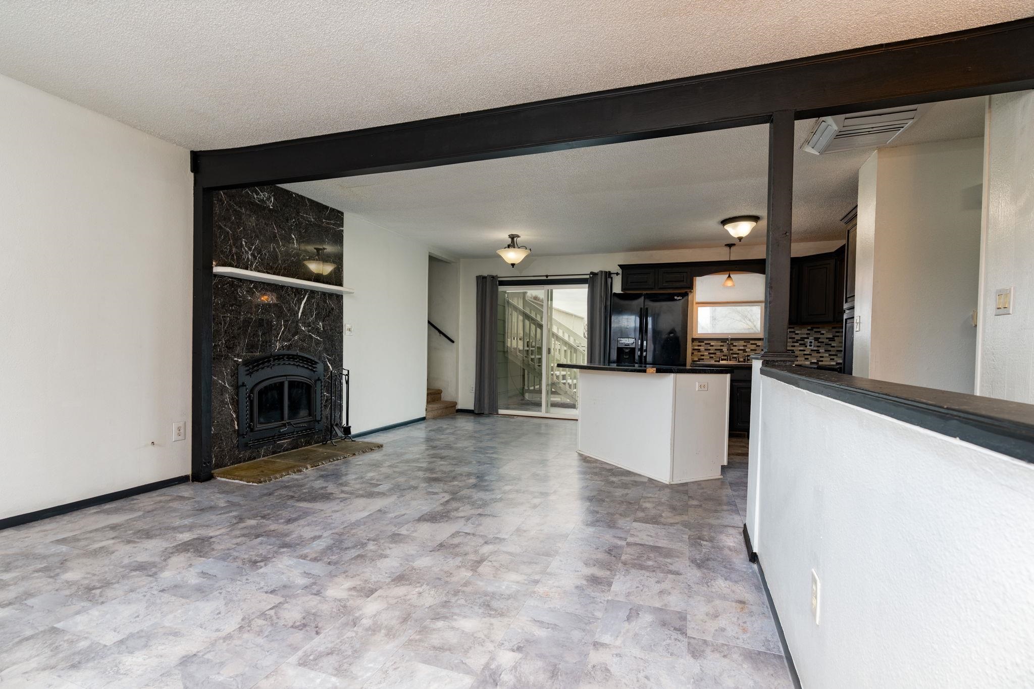559 Court Road Grand Junction, CO 81501 - Photo 4 of 28 a view of a kitchen with refrigerator and a sink