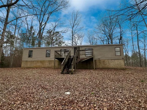 a view of a backyard of the house