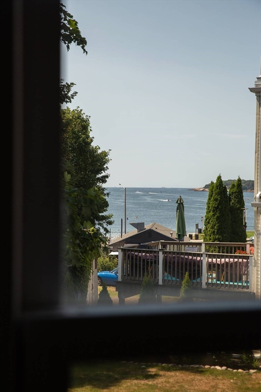 8 Angle Street, Unit C Gloucester, MA 01930 - Photo 13 of 15 a view of ocean from a balcony