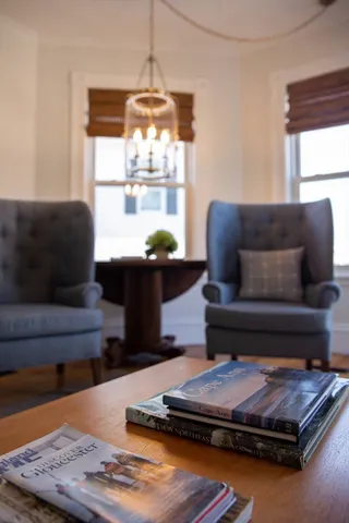 a living room with furniture and a window