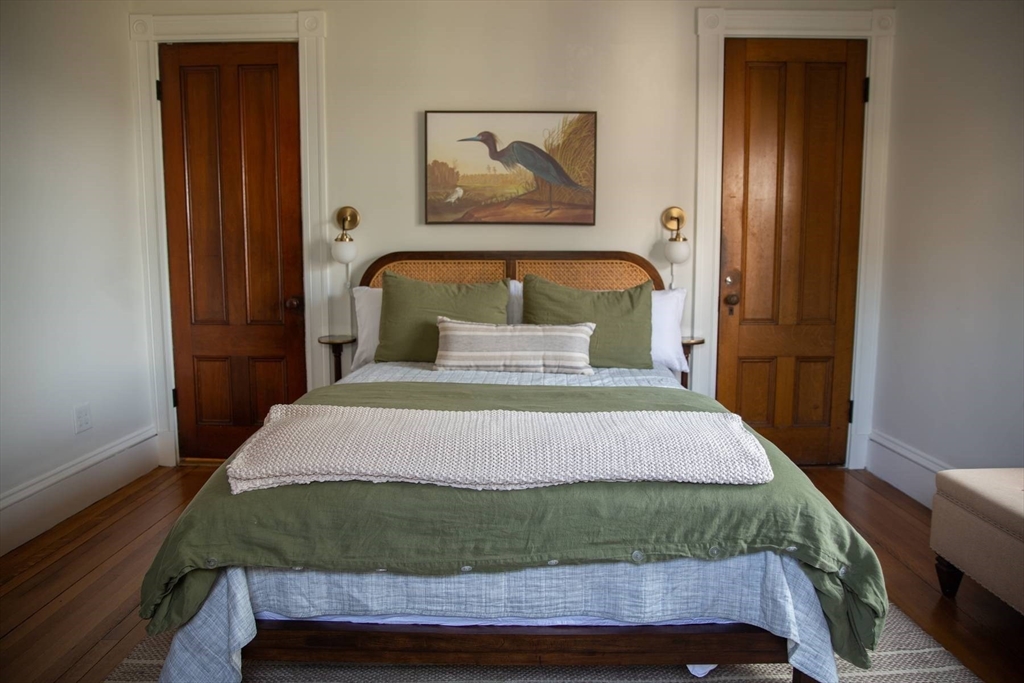 8 Angle Street, Unit C Gloucester, MA 01930 - Photo 10 of 15 a bedroom with a bed and a window