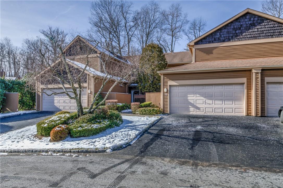 18 Indian Hill Road, Unit 18 New Rochelle, NY 10804 - Photo 1 of 1 a front view of a house