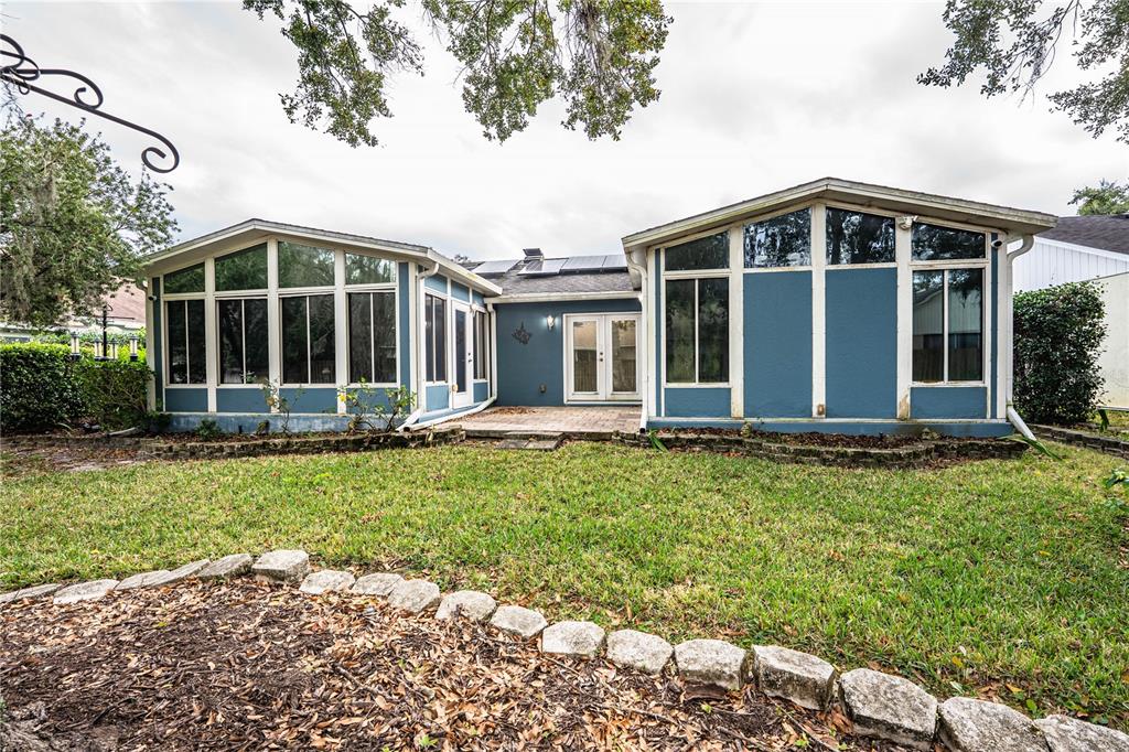 2724 Sundance Place Mulberry, FL 33860 - Photo 40 of 40 a view of front of house with a yard