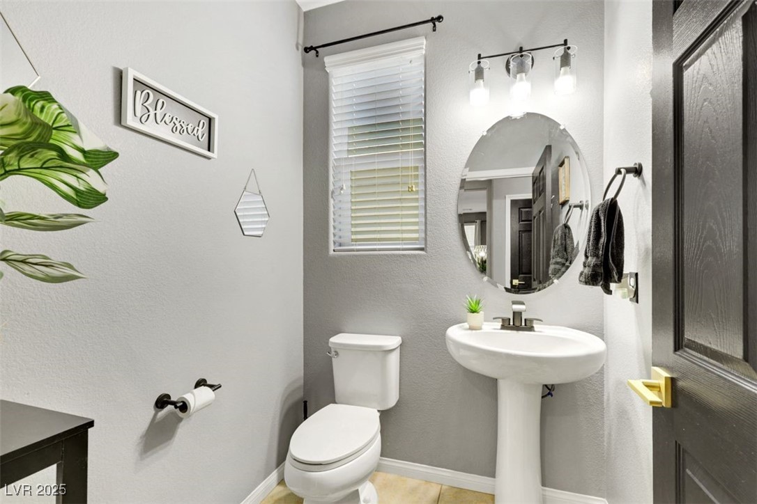 2073 Hocus Pocus Place Henderson, NV 89002 - Photo 13 of 38 Downstairs half bathroom