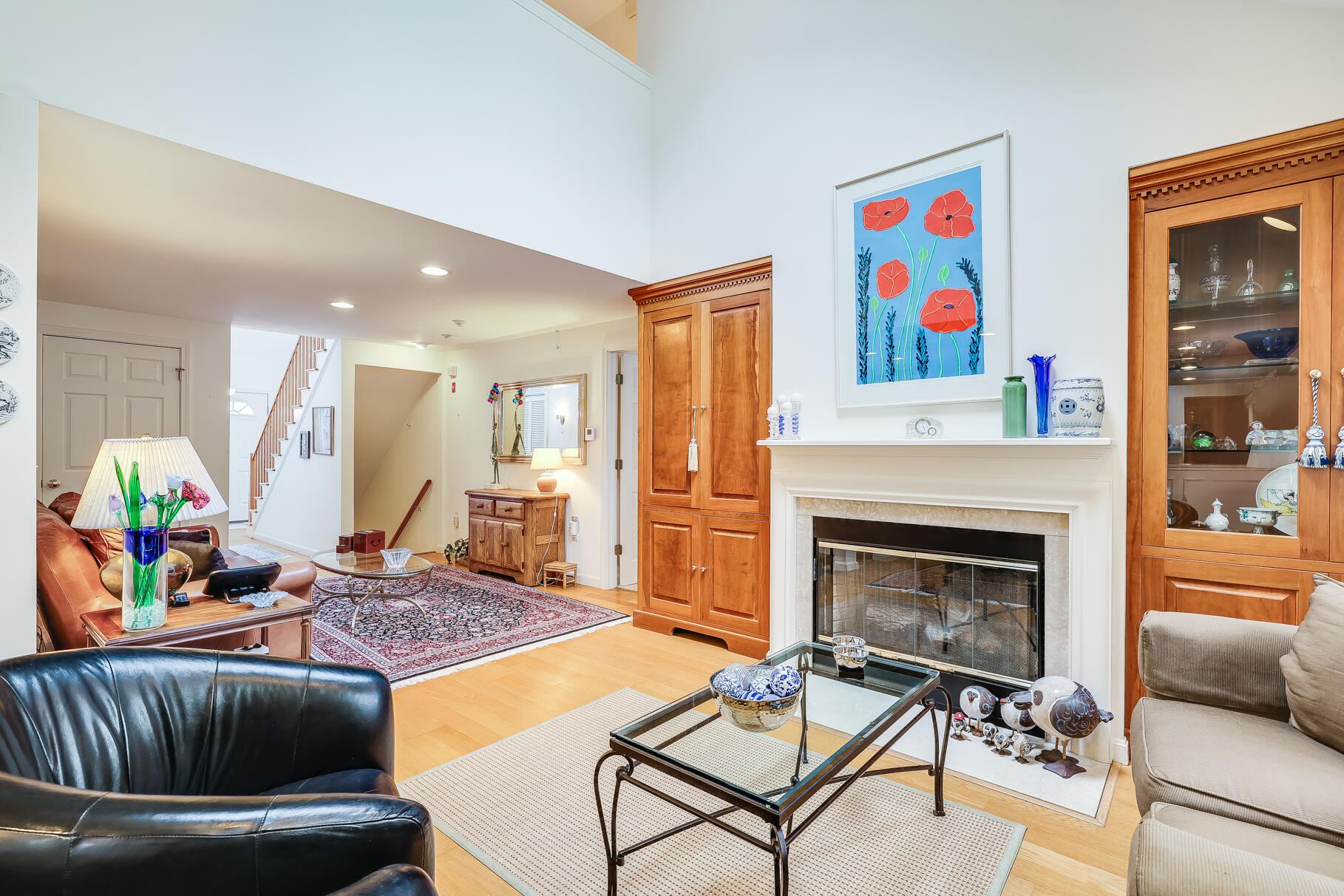 23 Longwood Road Mashpee, MA 02649 - Photo 14 of 66 a living room with furniture and a fireplace
