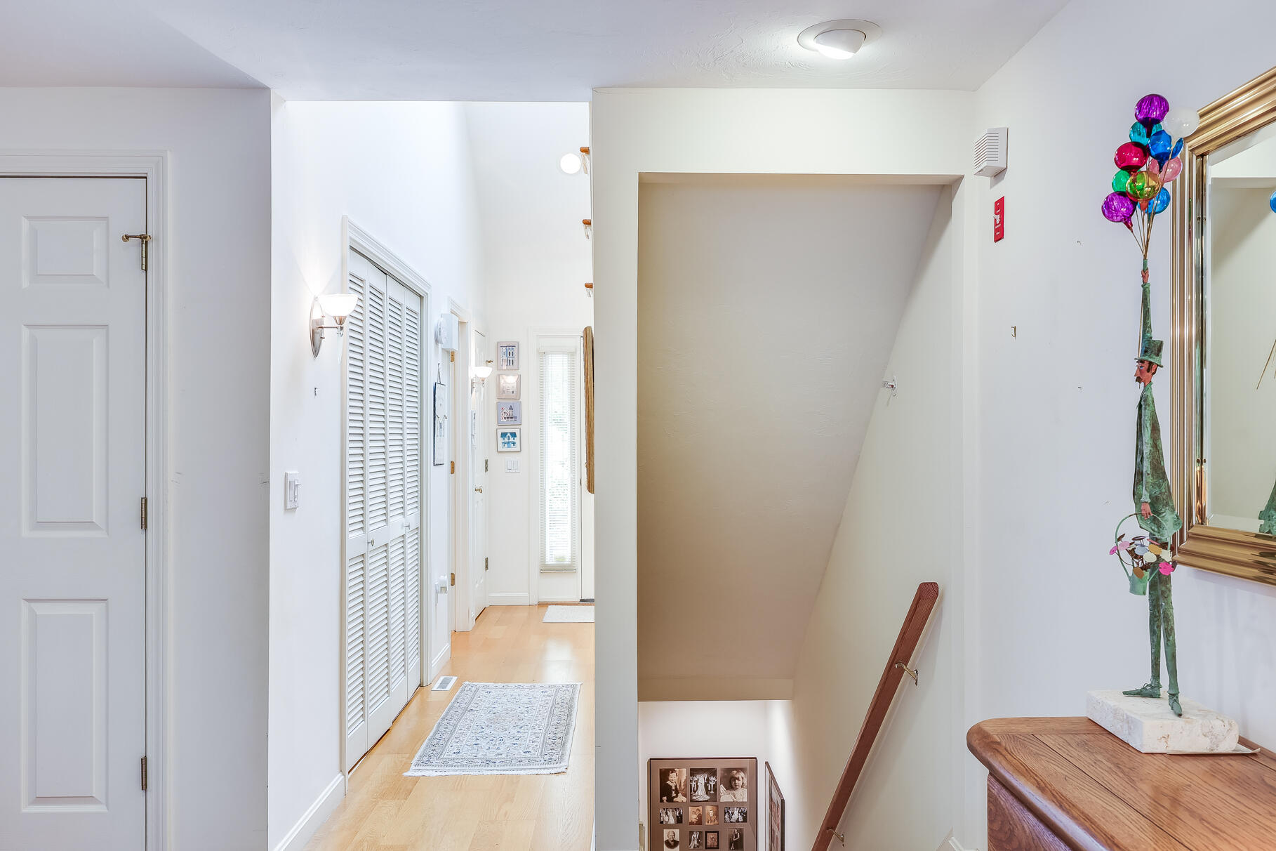 23 Longwood Road Mashpee, MA 02649 - Photo 23 of 66 a view of a hallway with a flower pot