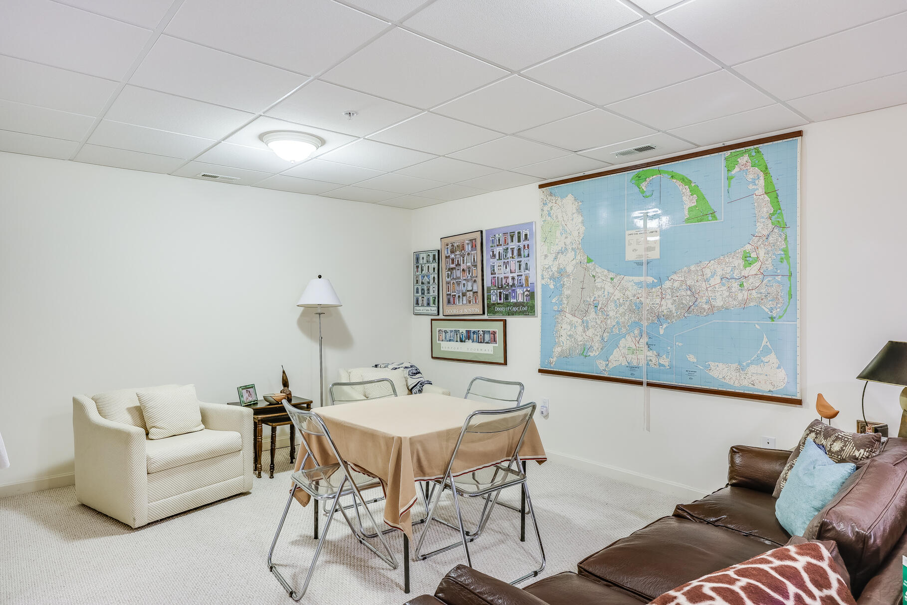 23 Longwood Road Mashpee, MA 02649 - Photo 43 of 66 a living room with furniture and wall paintings