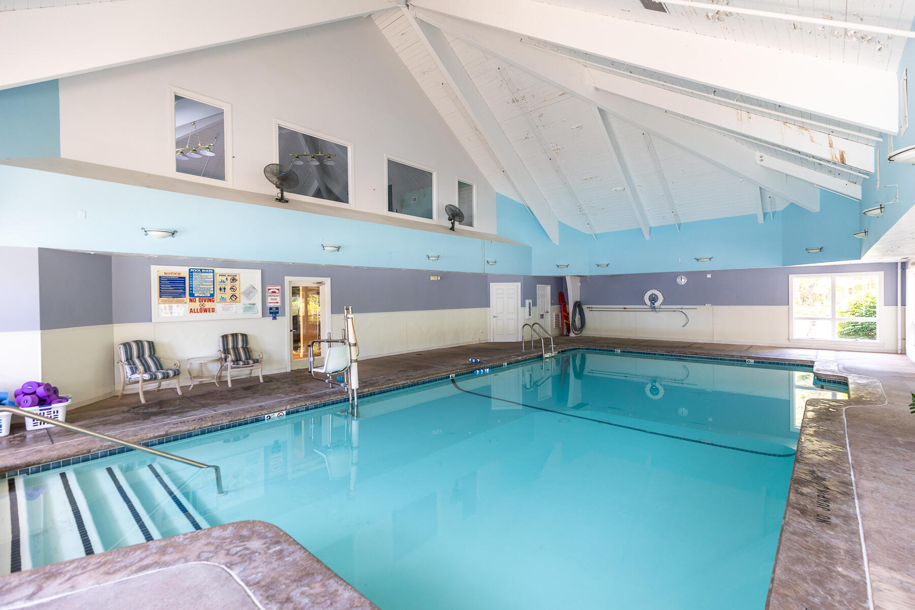 23 Longwood Road Mashpee, MA 02649 - Photo 53 of 66 a kitchen with a refrigerator and a view of living room