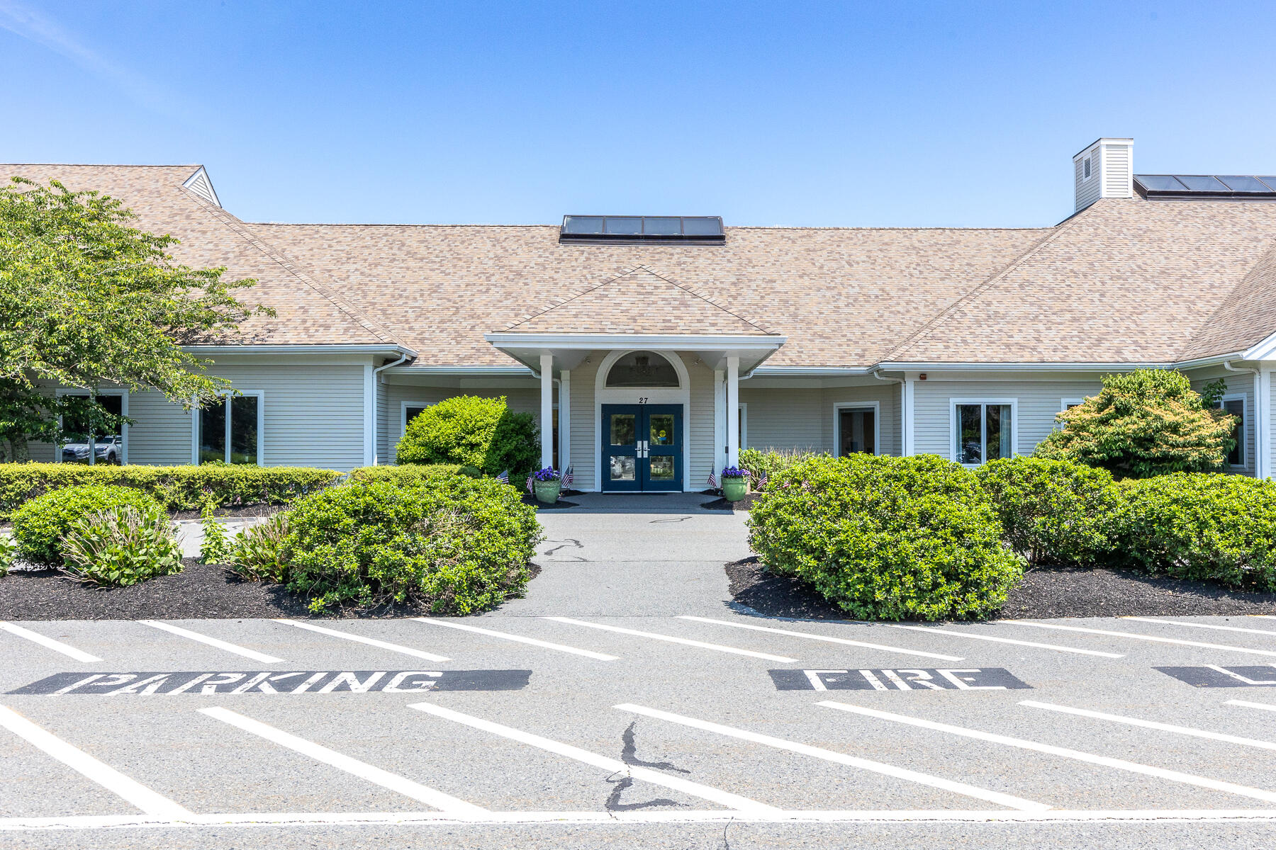 23 Longwood Road Mashpee, MA 02649 - Photo 60 of 66 front view of a house with a small yard