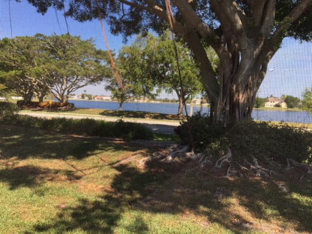 7151 Lockwood Road Lake Worth, FL 33467 - Photo 3 of 23 rear 1