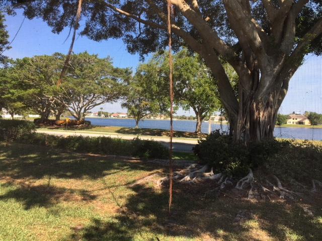 7151 Lockwood Road Lake Worth, FL 33467 - Photo 4 of 23 rear 2