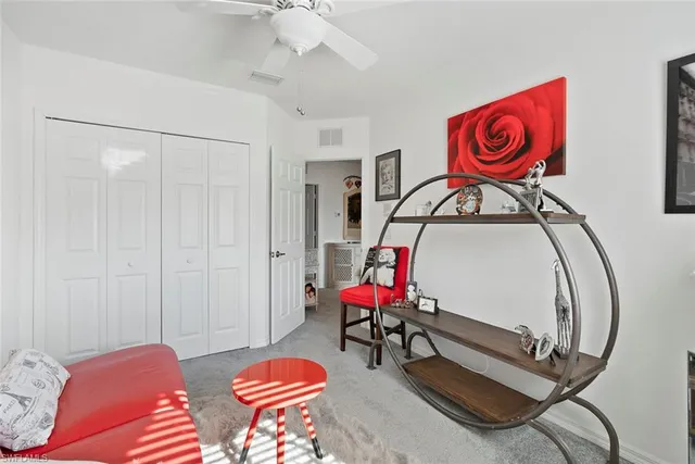a living room with furniture and rug