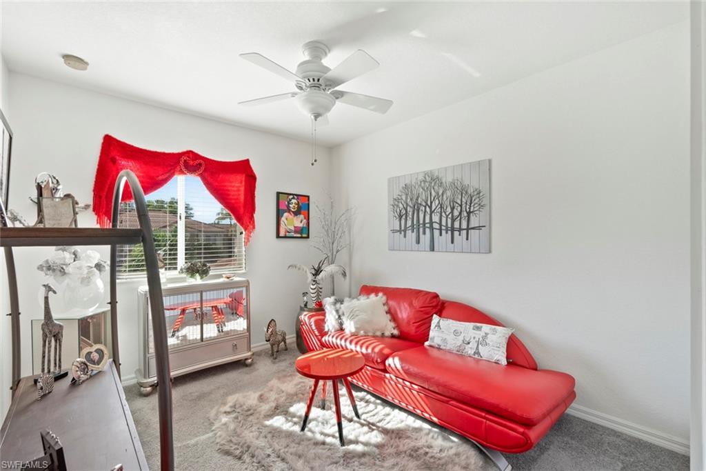 9838 Roundstone Circle Fort Myers, FL 33967 - Photo 16 of 25 a living room with furniture and a rug