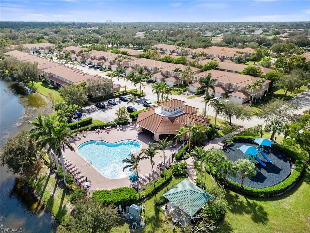 9838 Roundstone Circle Fort Myers, FL 33967 - Photo 21 of 25 an aerial view of residential houses with outdoor space and parking