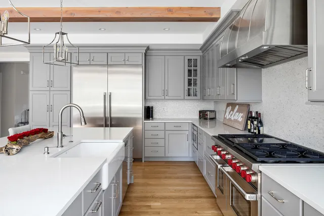 a dining area with furniture window and wooden floor