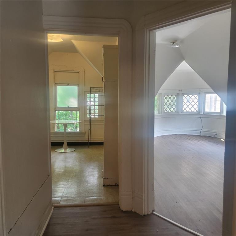 602 Mulberry Street, Unit 3 Pittsburgh, PA 15221 - Photo 11 of 11 an empty room with wooden floor and windows