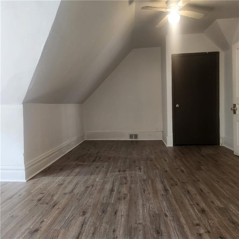 602 Mulberry Street, Unit 3 Pittsburgh, PA 15221 - Photo 4 of 11 a view of empty room with wooden floor