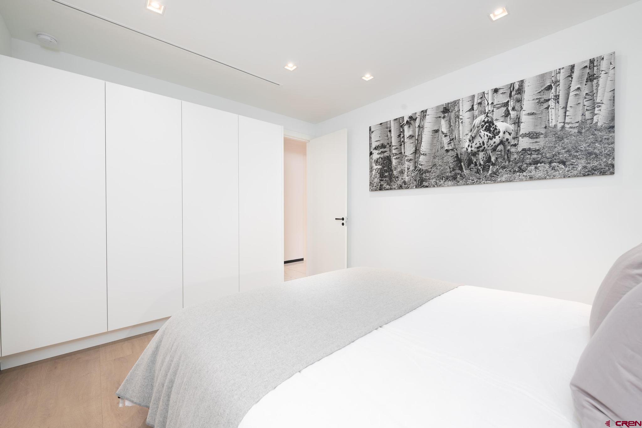 1201 Main Avenue, Unit 105 Durango, CO 81301 - Photo 11 of 45 a view of a room with a hallway