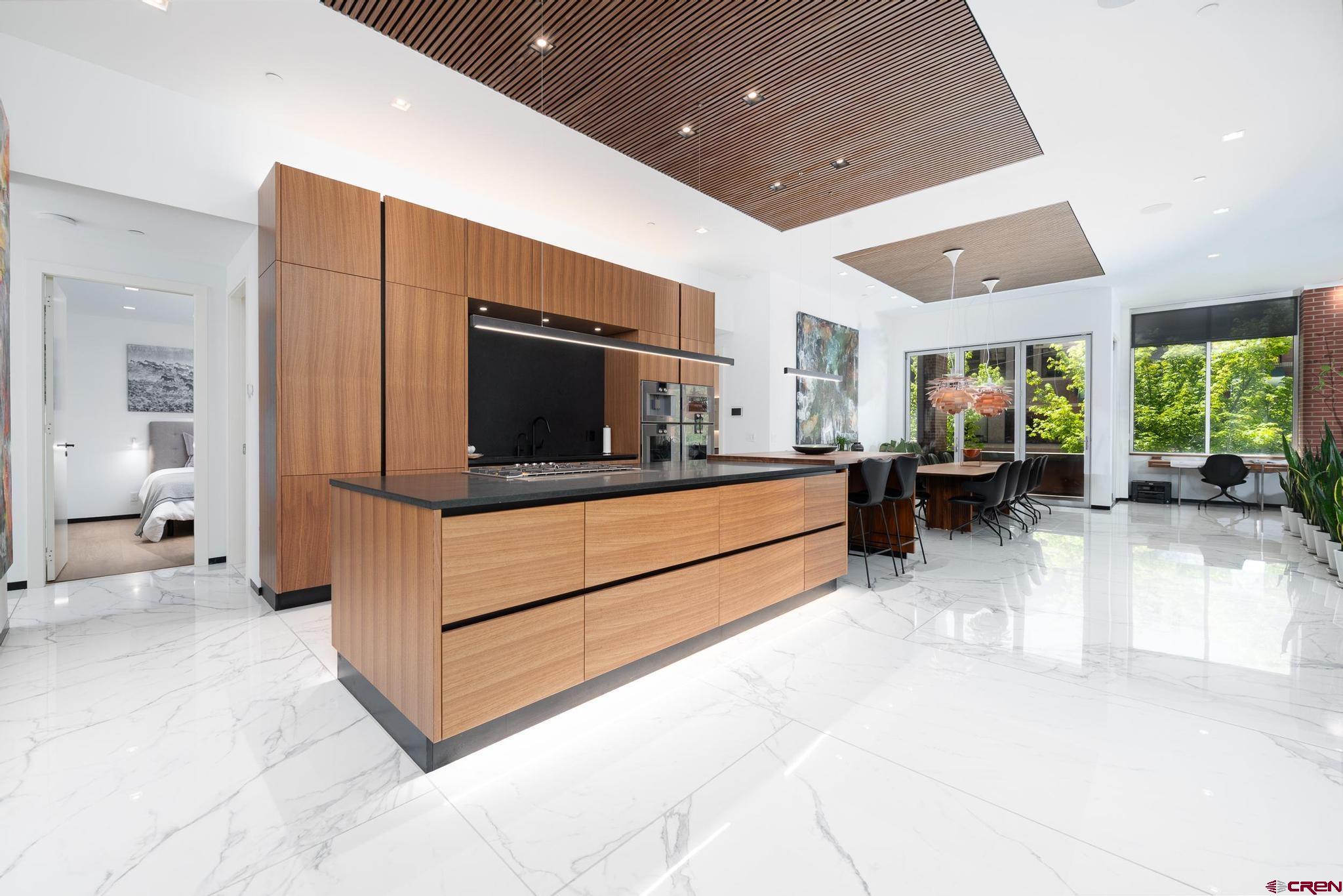 1201 Main Avenue, Unit 105 Durango, CO 81301 - Photo 15 of 45 a view of living room kitchen with stainless steel appliances cabinets