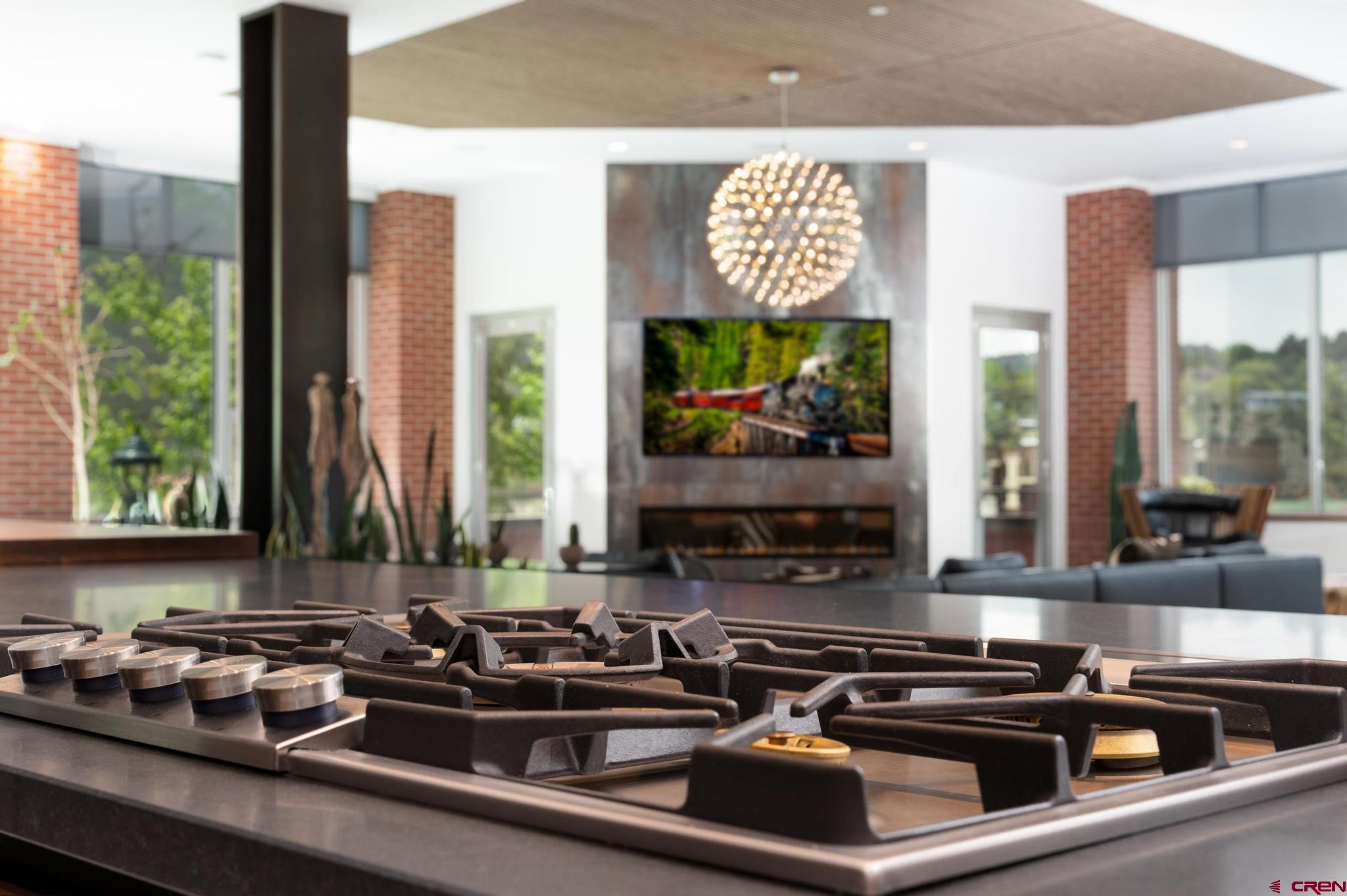 1201 Main Avenue, Unit 105 Durango, CO 81301 - Photo 15 of 45 a kitchen with a stove a sink and a microwave