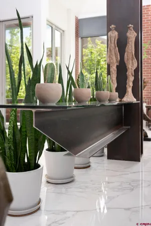 a view of a living room with a large window