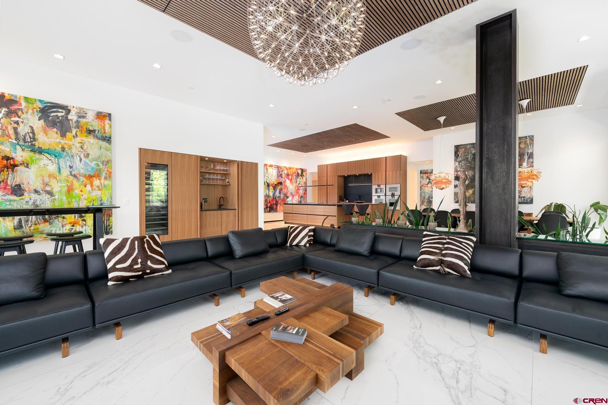 1201 Main Avenue, Unit 105 Durango, CO 81301 - Photo 19 of 45 a living room with furniture and a large window