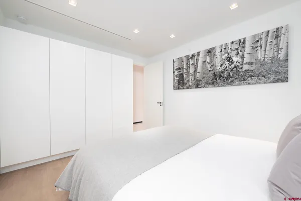 a view of a room with a hallway