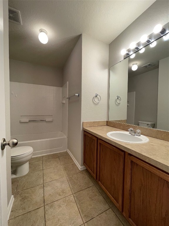 208 Spruce Drive Kyle, TX 78640 - Photo 14 of 26 a bathroom with a sink a toilet and mirror