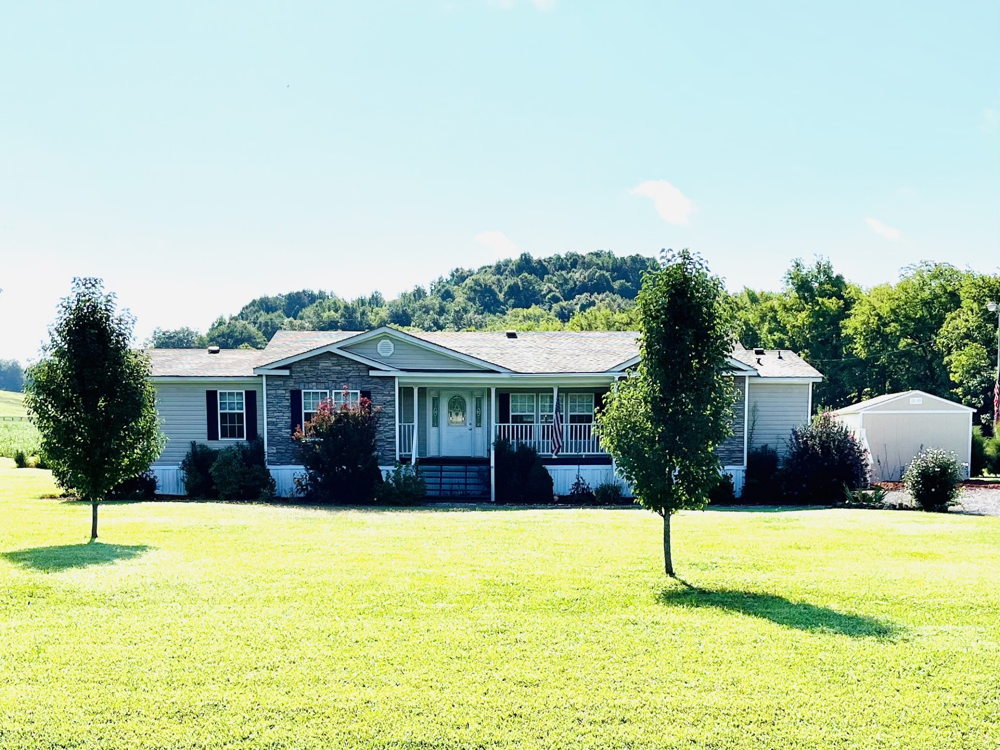 2621 Hagan Road Prospect, TN 38477 - Photo 1 of 18 a front view of a house with a yard