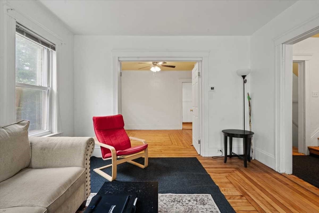 3 Wallace Street Worcester, MA 01605 - Photo 6 of 29 a living room with furniture and wooden floor