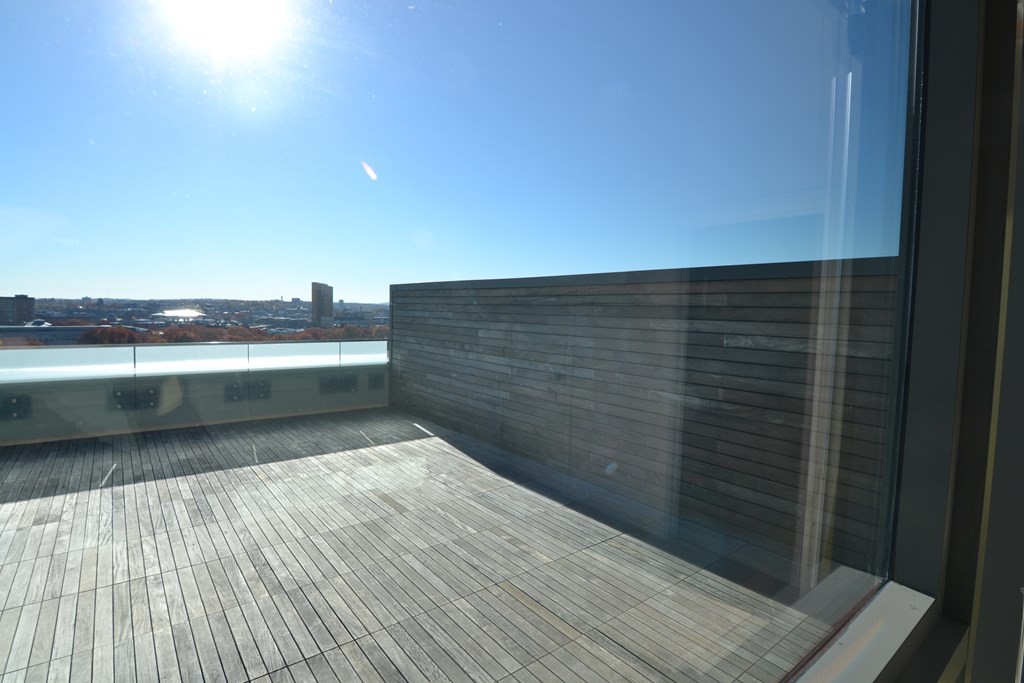 1282 Boylston Street, Unit 1514 Boston, MA 02215 - Photo 7 of 16 a view of room with wooden floor