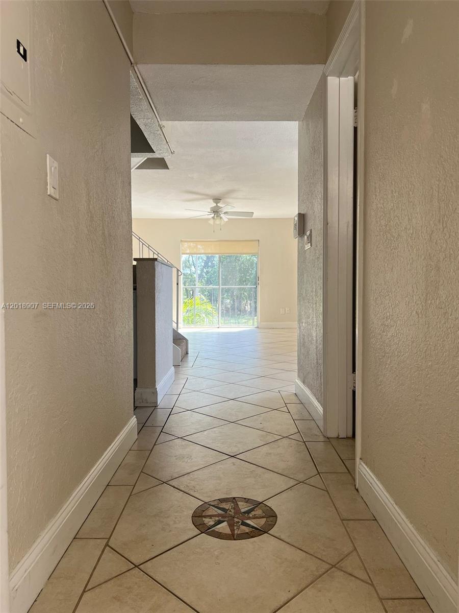 8600 Southwest 67th Avenue, Unit 938 Pinecrest, FL 33156 - Photo 11 of 15 a view of a hallway