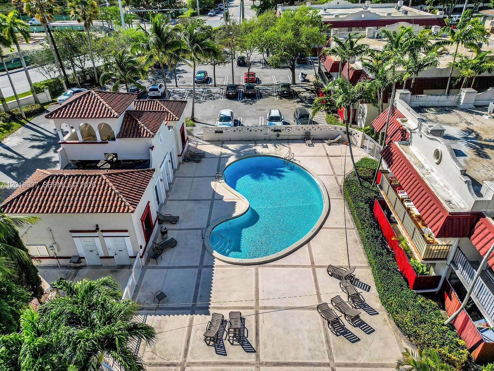 8600 Southwest 67th Avenue, Unit 938 Pinecrest, FL 33156 - Photo 15 of 15 a picture of city view with sitting space and plants