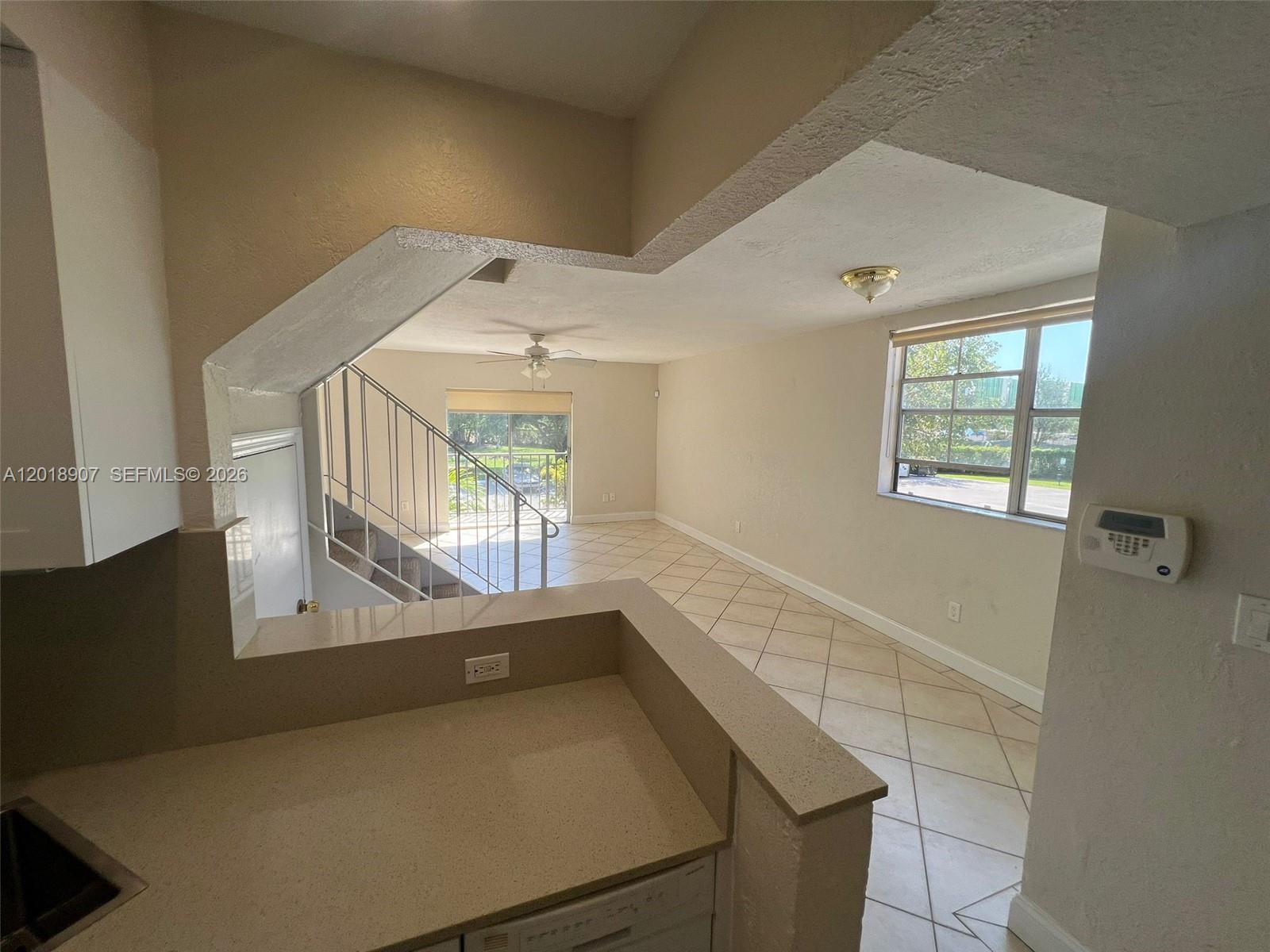 8600 Southwest 67th Avenue, Unit 938 Pinecrest, FL 33156 - Photo 4 of 15 a view of an empty room with a window