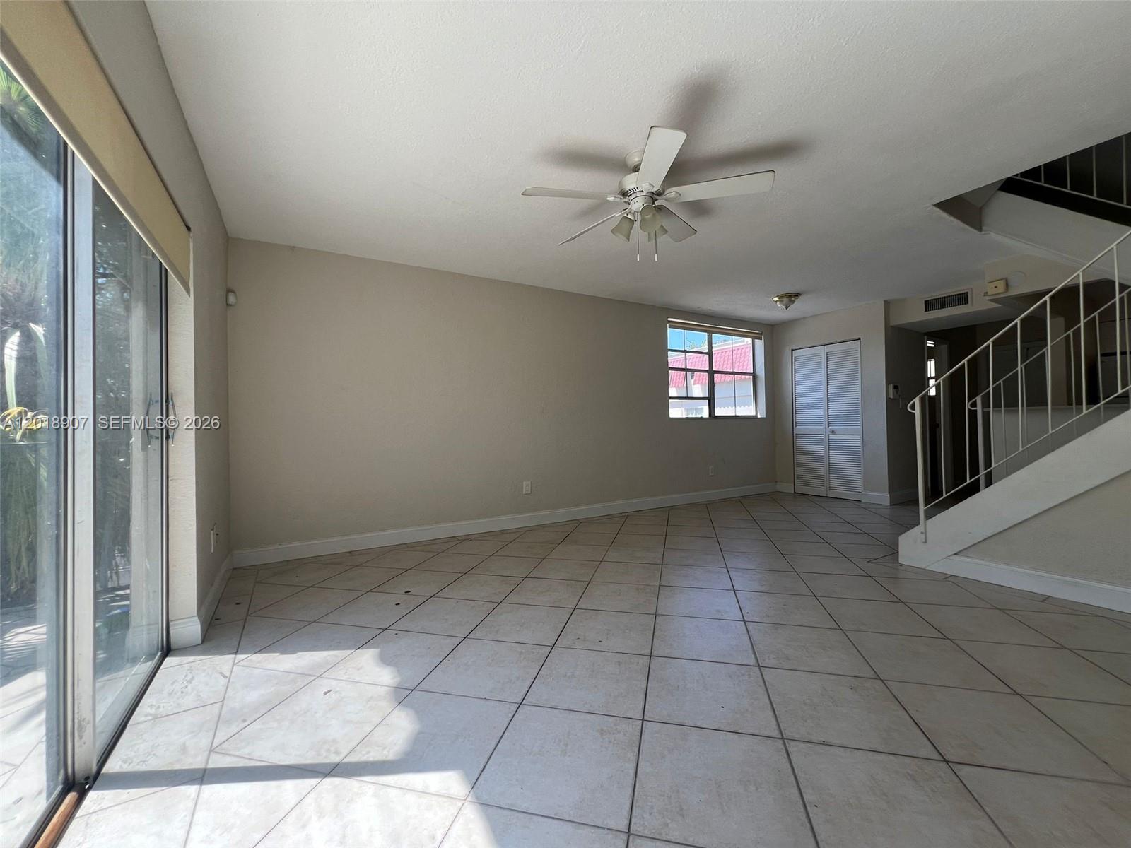 8600 Southwest 67th Avenue, Unit 938 Pinecrest, FL 33156 - Photo 10 of 15 a view of an empty room and window