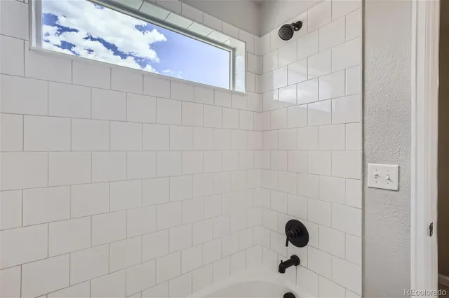 a bathroom with a bathtub