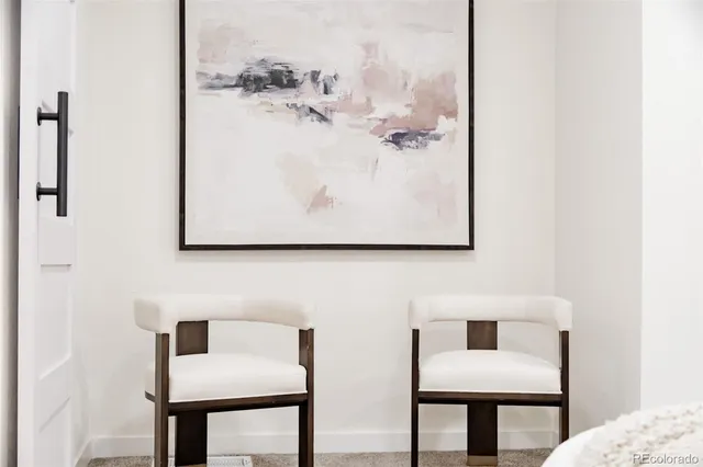 a view of a bathroom with a sink and a mirror
