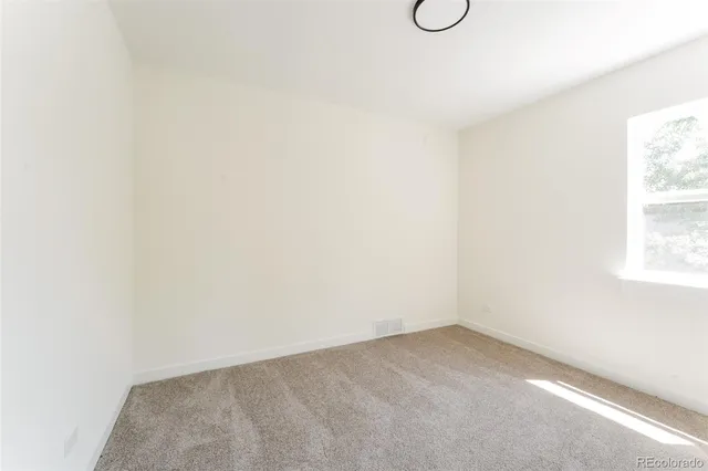 a view of a room with floor to ceiling window