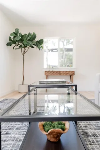 a vase of flowers sitting on a table