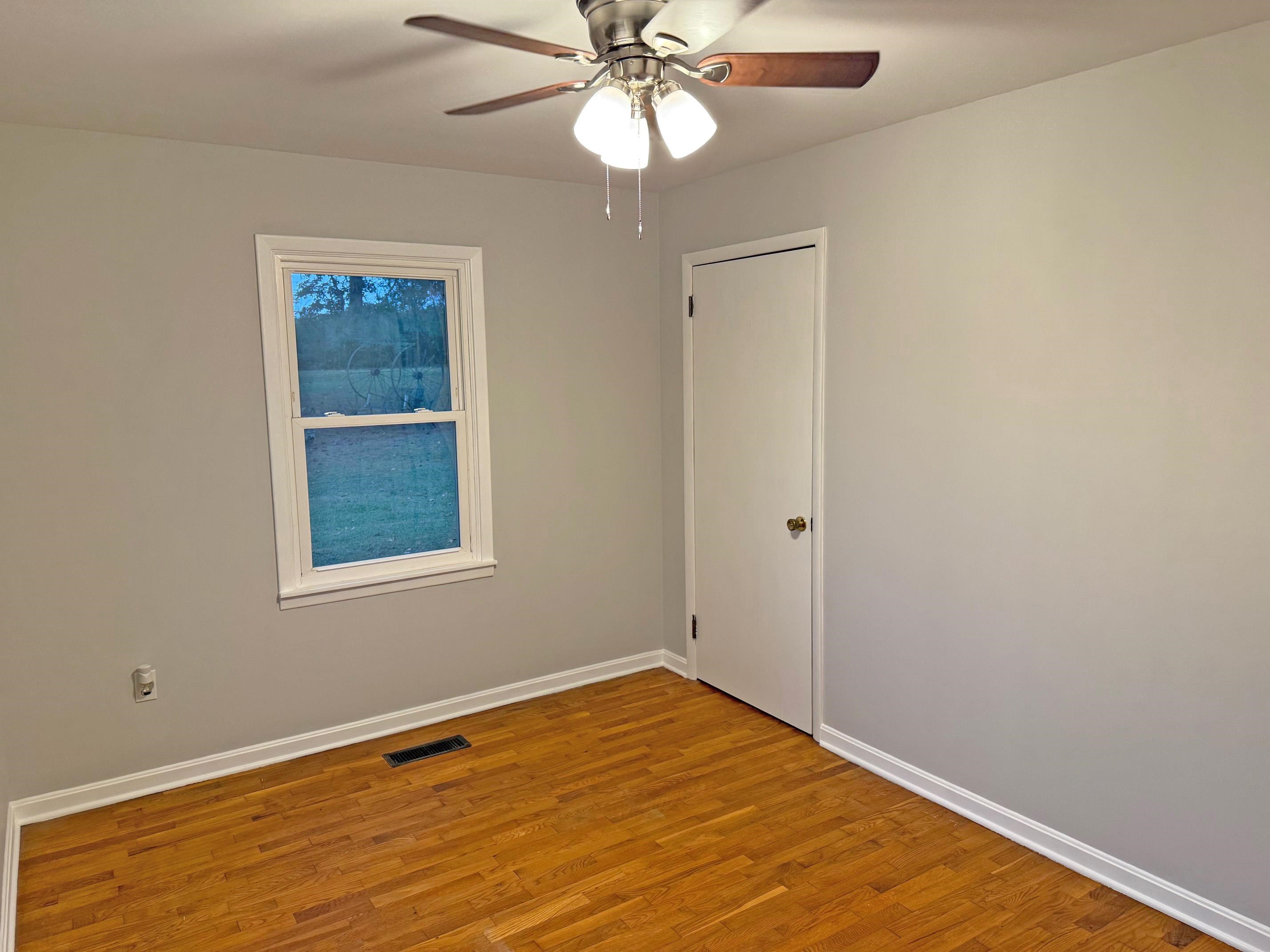 8540-8530 Glendale Road Morris Chapel, TN 38361 - Photo 12 of 21 a view of empty room with wooden floor