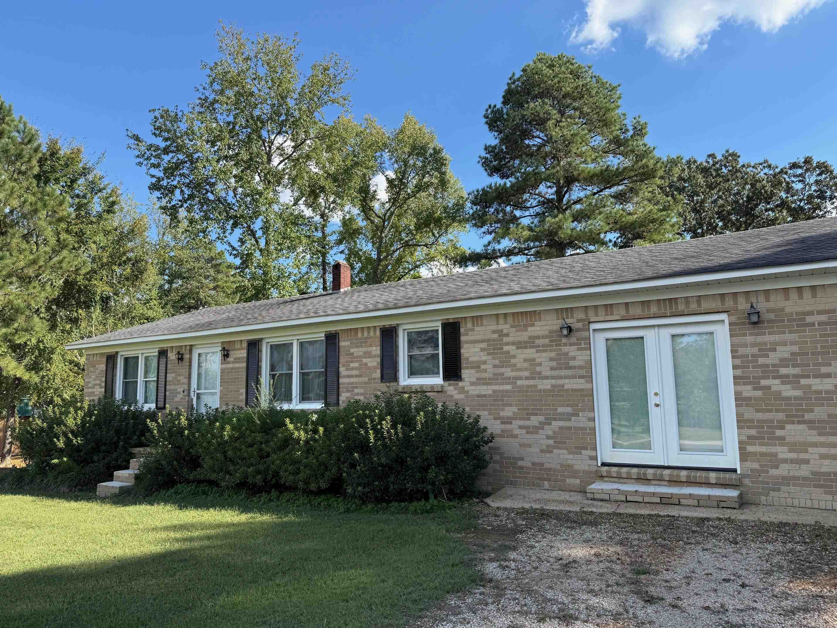 8540-8530 Glendale Road Morris Chapel, TN 38361 - Photo 13 of 21 a front view of a house with garden