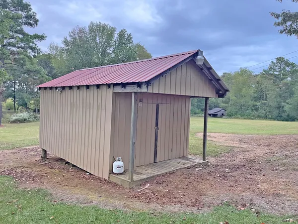 a backyard of a house with lots of green space