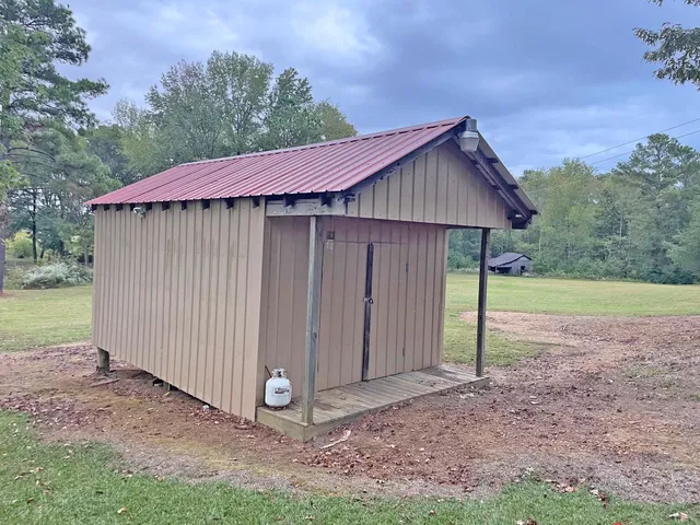 a backyard of a house with lots of green space